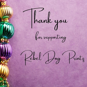May include: A purple background with a strand of Mardi Gras beads in gold, green, and purple. The text reads "Thank you for supporting Rebel Dog Printz" in a stylish script font.