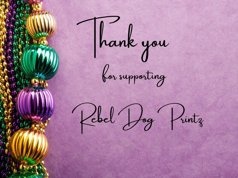 May include: A purple background with a strand of Mardi Gras beads in gold, green, and purple. The text reads "Thank you for supporting Rebel Dog Printz" in a stylish script font.