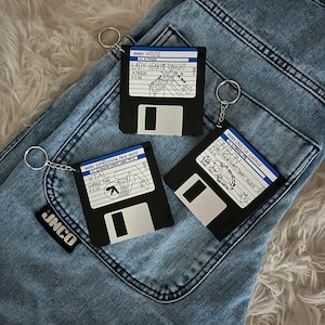 3,25" diskettnyckelring med anpassad musik (äkta/fungerande och innehåller data på diskett)