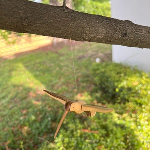 Hummingbird hand carved in wood with Varnished Finish