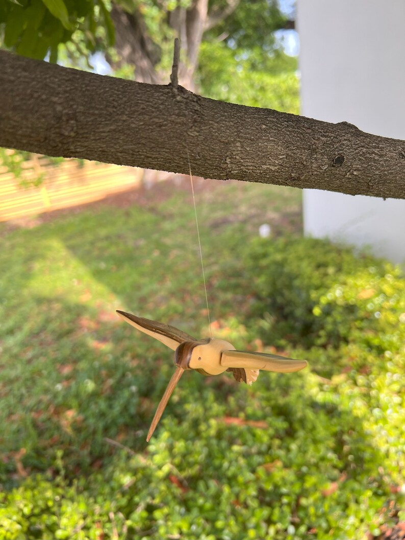 Hummingbird hand carved in wood with Varnished Finish