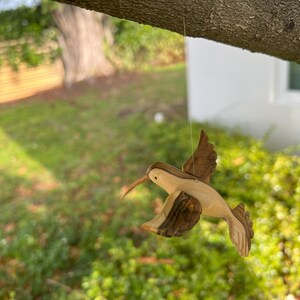 Hummingbird hand carved in wood with Varnished Finish