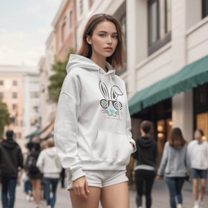Trending HypnoBunny Sweatshirt Hoodie, Viral Trending HypnoBunny Oversized Hoodie, Cozy Hoodie. A perfect choice for any cold day. In the front, the spacious kangaroo pocket adds daily for extra style points.
#Viral #HypnoBunny #Hoodie #Trending