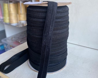 Black Foldover Elastic. Black Banding. Black Foldover Straps elastic.  5/8” Sold by the yard.