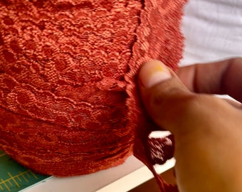 Stretch lace trim. Sold by the yard.