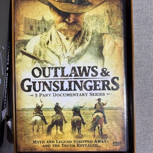 Outlaws and Gunslingers - Collectible Tin-  Pre Owned