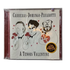 May include: CD case featuring a cartoon illustration of Carreras, Domingo, and Pavarotti, holding roses and a heart-shaped gift. The text reads "A Tenors Valentine" with a "The Nice Price" sticker.