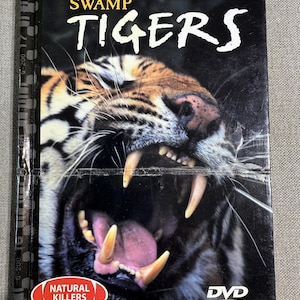 Swamp Tigers (Book and DVD Video) Hardcover – January 1, 2003