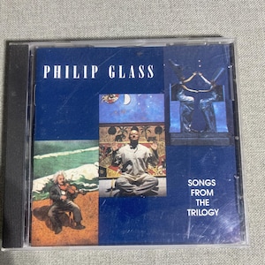 Glass: Songs from the Trilogy, Pre Owned CD