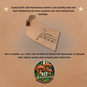 May include: A brown cardboard mailer envelope with the text VITA the green bookwrap printed on the front. Below the envelope is a circular sticker featuring a forest scene with red and white mushrooms and the text NSE Adventures in white.