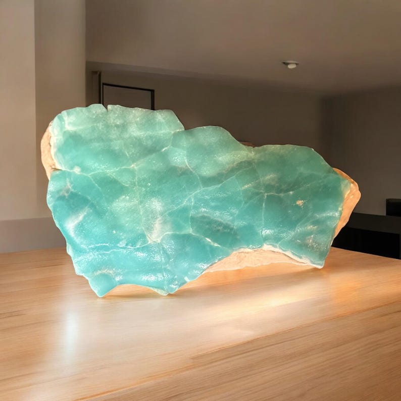 High quality Blue Aragonite on matrix specimen from Crazy Ohio Crystals, weighing 150 grams and measuring 3.5 inches wide, showcasing vibrant aqua-blue crystals on natural earthy base.