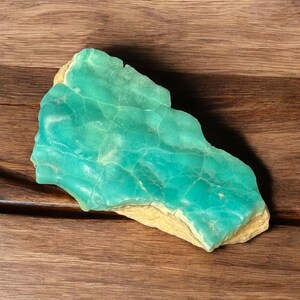 High quality Blue Aragonite on matrix specimen from Crazy Ohio Crystals, weighing 150 grams and measuring 3.5 inches wide, showcasing vibrant aqua-blue crystals on natural earthy base.