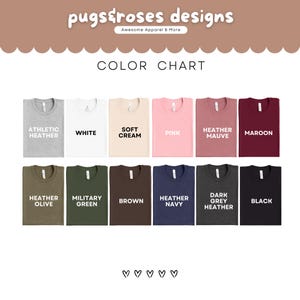 May include: Color chart of t-shirts in various colors, including athletic heather, white, soft cream, pink, heather mauve, maroon, heather olive, military green, brown, heather navy, dark grey heather, and black. The brand name "pugs&roses designs" is at the top.
