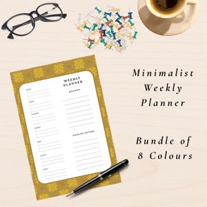 May include: A minimalist weekly planner with a gold patterned border, a black pen, and a collection of colorful push pins. The text reads "Minimalist Weekly Planner" and "Bundle of 8 Colours". Also, a pair of black glasses and a cup of coffee.