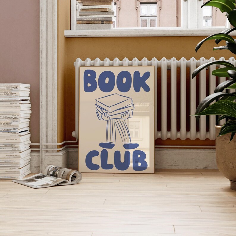 May include: A blue and white poster with the text "BOOK CLUB" in large, bold letters. A cartoon illustration of a person carrying a stack of books on their back is below the text.