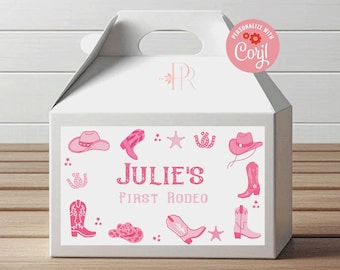 May include: White favor box with a pink and white label. The label has a pink cowboy hat, boots, and stars. The text on the label reads "Julie's First Rodeo".