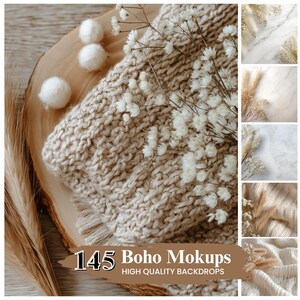 May include: A neutral-toned, chunky knit blanket with a fringed edge is draped over a wooden surface. White flowers and three white pom-poms are arranged on the blanket. The image includes a collage of high-quality backdrops with the text "145 Boho Mockups".