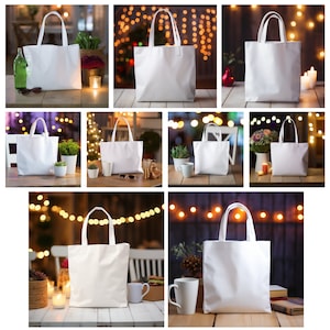 Puede incluir: Nueve bolsas de tela blancas con asas se muestran en varias superficies, incluyendo mesas de madera y una superficie blanca. Algunas de las superficies están decoradas con luces de cadena. Las bolsas están todas vacías y parecen estar hechas de lona.