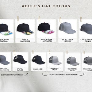 May include: A selection of adult hats, including baseball caps and trucker snapbacks, in various colours. The hats are shown in black, light grey, and charcoal grey, with some featuring Hawaiian-themed brims. The text "ADULT'S HAT COLORS" is at the top.