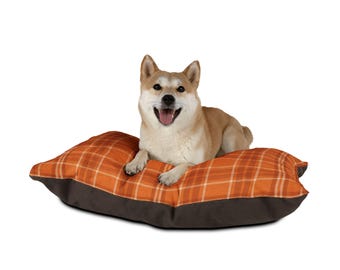 Cama para mascotas a cuadros naranjas /