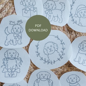 May include: A collection of white circular patches with embroidered dog designs. The dogs are depicted in various festive outfits, including antlers, bows, and Santa hats. A green circle in the center reads "PDF DOWNLOAD".