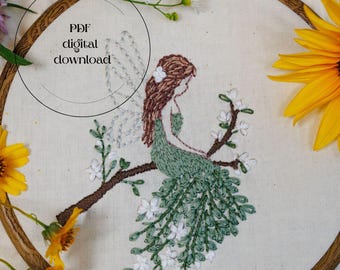 May include: An embroidered fairy design in a wooden hoop. The fairy is depicted in green and brown thread, seated on a branch with white flowers. The text "PDF digital download" is in a circle. Yellow sunflowers and white flowers are in the background.