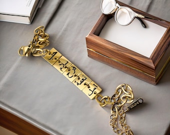 Pulsera grabada en árabe, de acero inoxidable bañada en oro de 18 quilates, con dijes