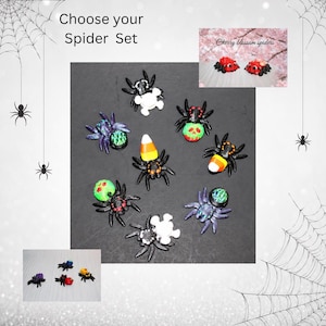 May include: A collection of decorative spider sets with various designs and colors. The image includes spiders with candy corn, green and red accents, and floral patterns. Text reads "Choose your Spider Set" and "Cherry blossom spiders."