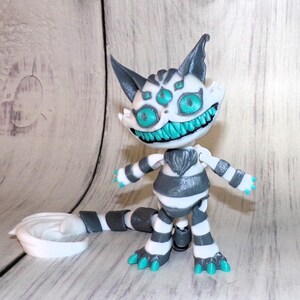 3D Printed Articulated Creepy Cat Fidget Toy: Themed Decor