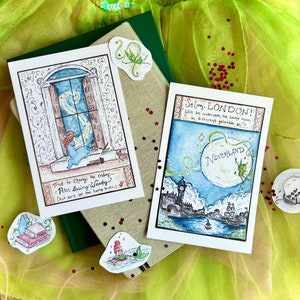 May include: Two illustrated cards with a whimsical theme. The first card features a window with a starry sky and the text "Tried to change the ending... Peter losing Wendy (But don't let the lamp burn)". The second card features a moon with the text "So long, LONDON! We'll be underneath the same moon in different galaxies... NEVERLAND".