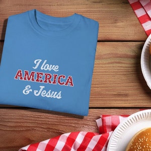 I love America and Jesus Unisex Garment-Dyed Cotton Tee | Fourth of July Independence Day T-shirt | Christian Patriotic | For Men and Women