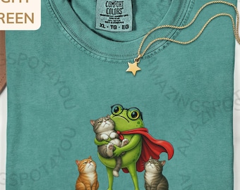T-shirt humoristique pour amoureux des chats avec une grenouille : « Nous sommes jugés par les chats à l'aube », T-shirt sarcastique pour maman chat, Cadeau mignon pour papa chat, T-shirt humoristique sur les animaux