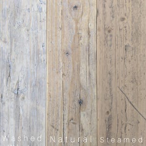 May include: Three vertical wooden planks showing distinct grain patterns and knots. The left plank is labeled Washed White, the center plank is labeled Natural, and the right plank is labeled Steamed Beech, displaying varied light brown and grey tones.