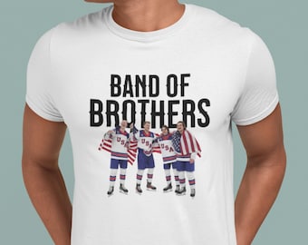 Team USA Olympic Hockey Spirit Lightweight Tee - Jack Hughes, Quinn Hughes, Matthew Tkachuk, Brady Tkachuk Fan Apparel