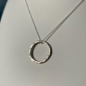Hammered sterling silver ring pendant