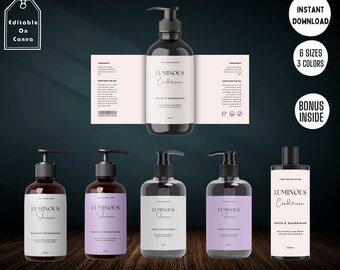 May include: Five bottles of shampoo and conditioner with black pump tops and labels that say "LUMINOUS" and "Vanilla & Sandalwood". The bottles are arranged in a row on a wooden surface. The labels are white with black text. The bottles are all the same size and shape.