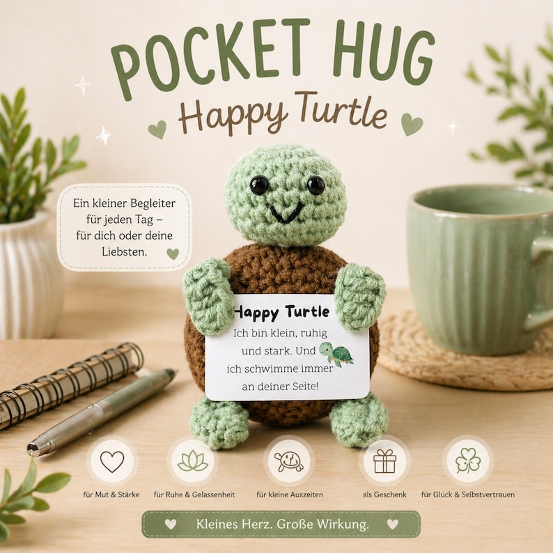 May include: A crocheted Happy Turtle with a green head and limbs, and a brown body. The turtle holds a card with text. The image includes the text "POCKET HUG Happy Turtle" and other text in German.