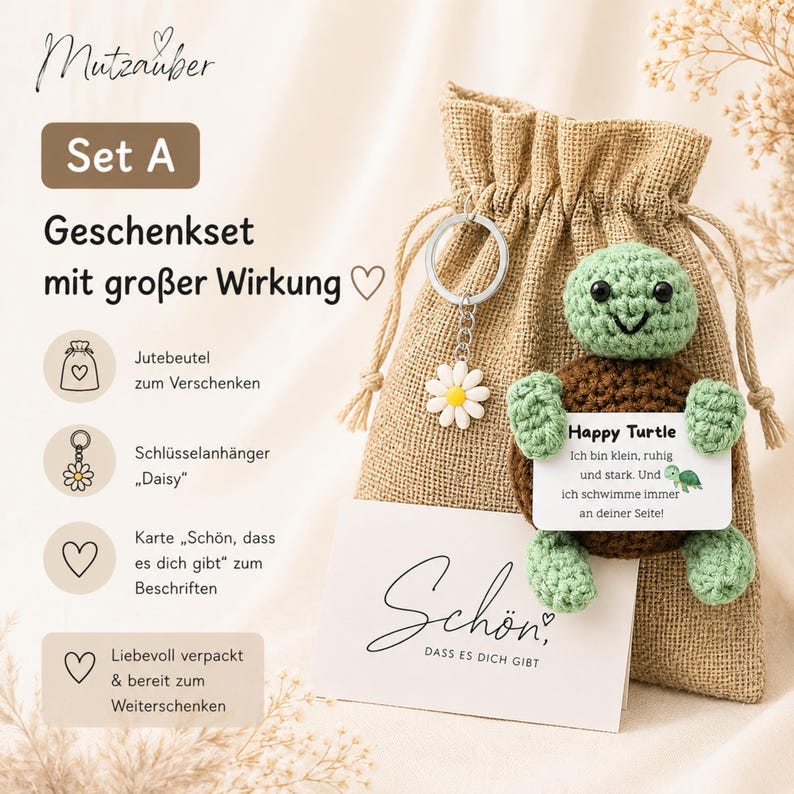 May include: A gift set labeled "Set A" includes a burlap bag, a daisy keychain, a card, and a crocheted turtle holding a sign that says "Happy Turtle". The card says "Sch&ouml;n, dass es dich gibt".