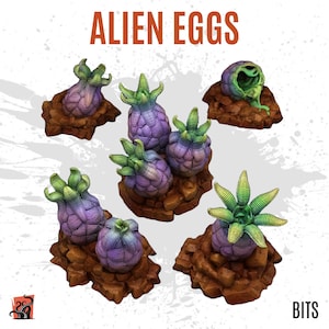 Puede incluir: Seis huevos alienígenas, pintados en tonos de morado, verde y marrón, se muestran sobre bases rocosas. Los huevos tienen forma de vainas con zarcillos y están etiquetados como "Alien Eggs".