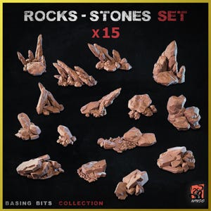 Puede incluir: Un conjunto de 15 miniaturas de rocas y piedras marrones y grises para juegos de mesa o modelismo. El conjunto se llama "Rocks - Stones Set x15" y forma parte de la "Basing Bits Collection".