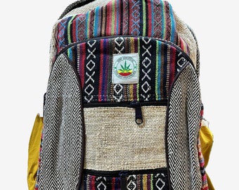 May include: A multi-coloured hemp backpack with a large front pocket and a smaller pocket on each side. The backpack has a zipper closure and a hemp leaf logo with the text "Hemp Vibes" and "Keep It Green" on the front.