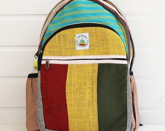 May include: A multi-coloured hemp backpack with a green leaf logo. The backpack has a large main compartment, a smaller front pocket, and adjustable shoulder straps.