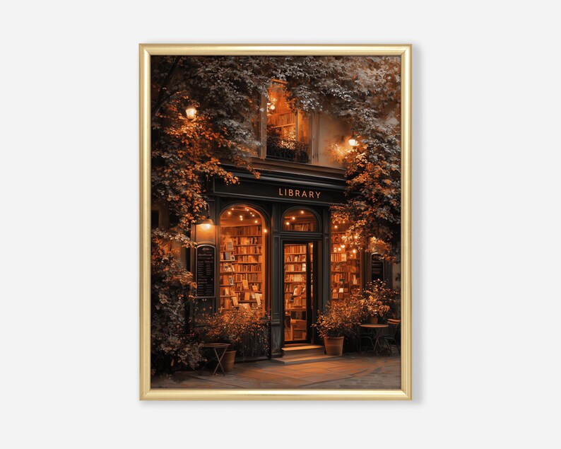 May include: A framed print of a library exterior at dusk. The building has a black facade with the word "LIBRARY" above the entrance. The interior is lit, showcasing bookshelves. Warm lighting and foliage frame the entrance, creating a cozy atmosphere.