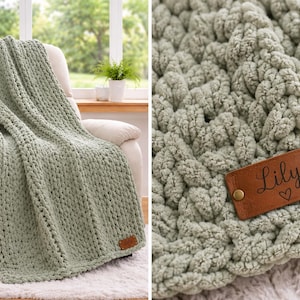May include: A sage green chunky knit throw blanket featuring a textured cable stitch pattern. A rectangular brown faux leather tag is attached to the corner with two gold-toned metal rivets, displaying the name Lily and a small heart icon.