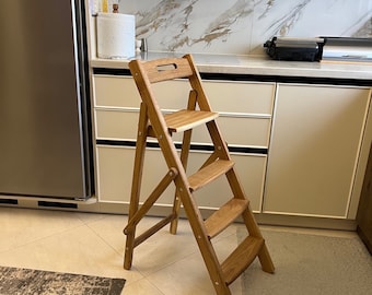 A wooden folding ladder made of oak in two sizes110/130 cm high(43/51inches)for home, kitchen,library,flower stand  interior. Stepladder.