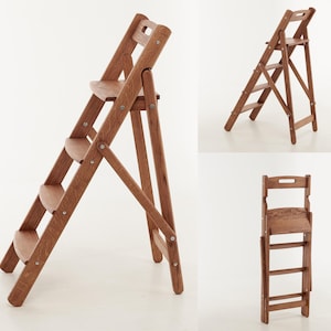 May include: A wooden folding step stool with three steps and a handle at the top. The stool is made of light brown wood and has a classic design. The stool is shown in three different positions: open, partially open, and folded.
