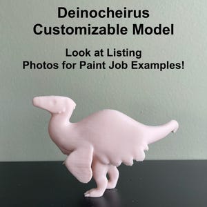 May include: A pale pink 3D printed model of a Deinocheirus dinosaur. The model is standing on a black surface. The text "Deinocheirus Customizable Model" and "Look at Listing Photos for Paint Job Examples!" is visible above the model.