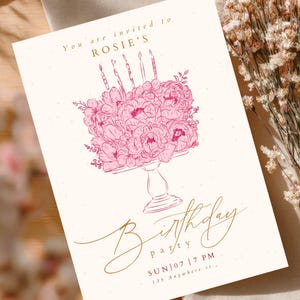 May include: A rectangular invitation card featuring a pink line-art illustration of a floral cake on a pedestal with candles. The text reads: You are invited to ROSIE'S Birthday party SUN | 07 | 7 PM 135 Anywhere st.