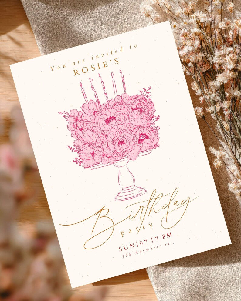 May include: A rectangular invitation card featuring a pink line-art illustration of a floral cake on a pedestal with candles. The text reads: You are invited to ROSIE'S Birthday party SUN | 07 | 7 PM 135 Anywhere st.