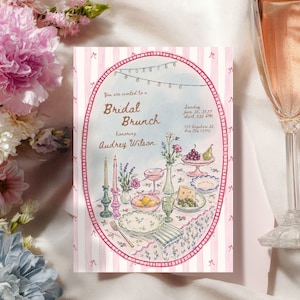 May include: A rectangular invitation card with a pink and white striped border featuring an oval illustration of a table set for a bridal brunch. The text reads: You are invited to a Bridal Brunch honoring Audrey Wilson, Sunday June 20, 2027.